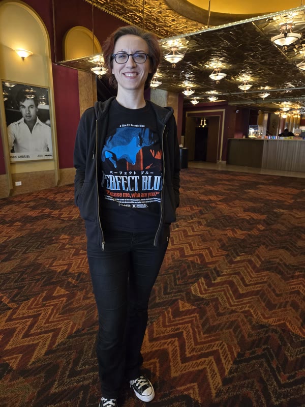 Attendee in Perfect Blue shirt